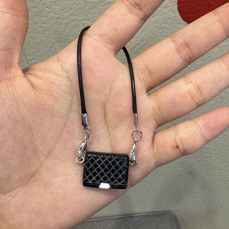 2025 New Women's Designer Cartoon Dollhouse Mini Camellia Black And White Bag Necklace Accessories Doll Pendant Accessories Handbag Accessories