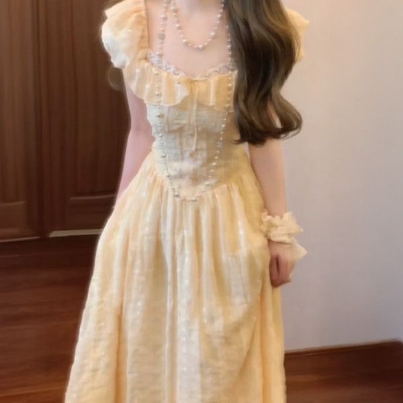 Summer New Women's Skirt Soft Yellow Square Neck Fluffy Sleeve Waist Strap Women's French Sweet Sweet Dress Niche Princess Dress New Luxury 