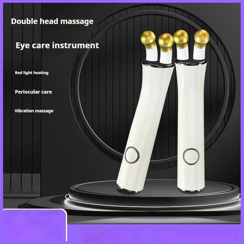 New Handheld Eye Roller Massager Wand Heat Vibration Skin Care Beauty Device