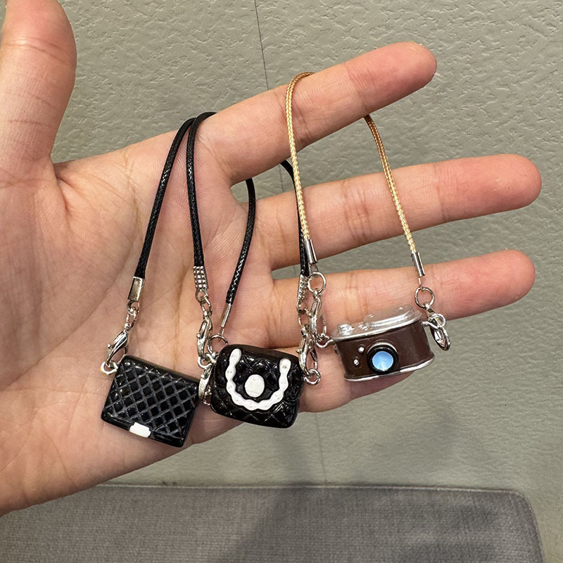 2025 New Women's Designer Cartoon Dollhouse Mini Camellia Black And White Bag Necklace Accessories Doll Pendant Accessories Handbag Accessories