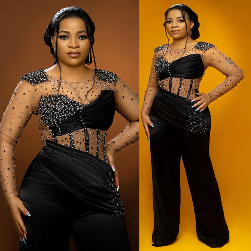 2025 Plus Size One-Piece Black Jumpsuits Prom Dresses for Black Women Sheer Neck Long Sleeves Pearls Birthday Party Dress Second Reception Gown Engage