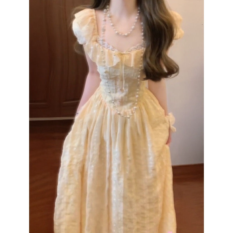 Summer New Women's Skirt Soft Yellow Square Neck Fluffy Sleeve Waist Strap Women's French Sweet Sweet Dress Niche Princess Dress New Luxury 
