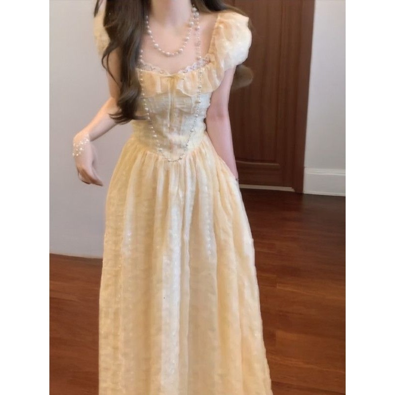 Summer New Women's Skirt Soft Yellow Square Neck Fluffy Sleeve Waist Strap Women's French Sweet Sweet Dress Niche Princess Dress New Luxury 