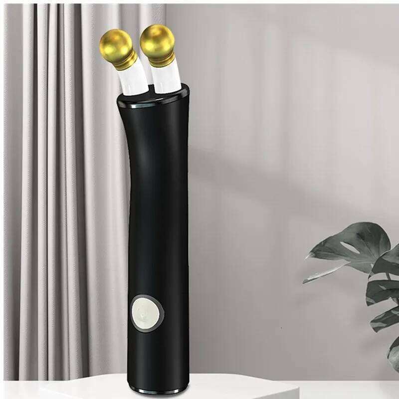 New Handheld Eye Roller Massager Wand Heat Vibration Skin Care Beauty Device