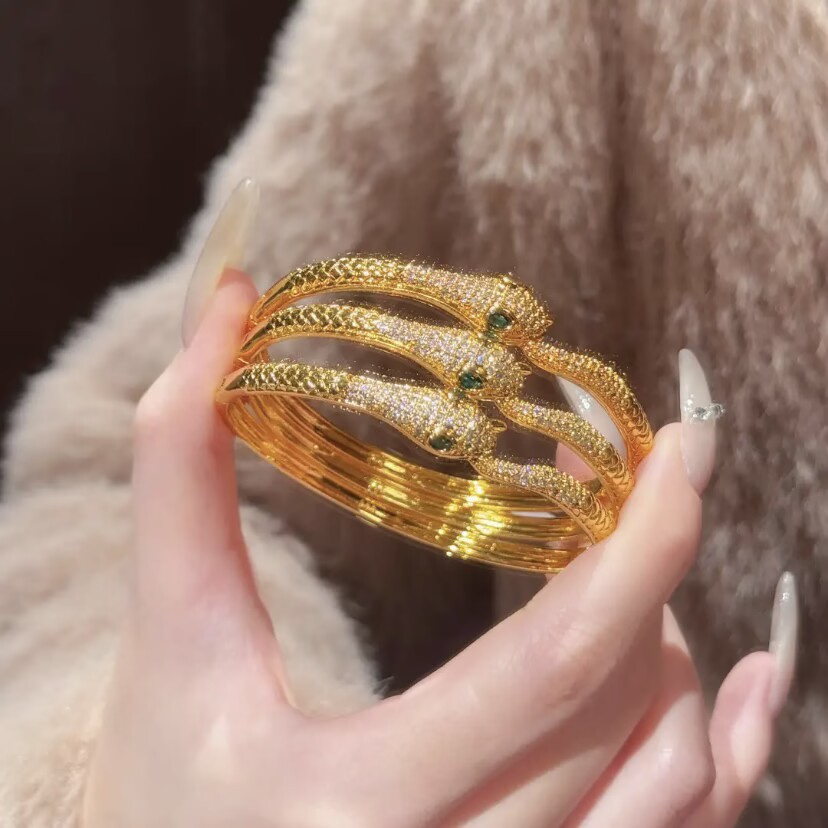 Stylish Eternity Band: Premium Sand Gold Charm Wrist Accessory Adorned With Shimmering Gems