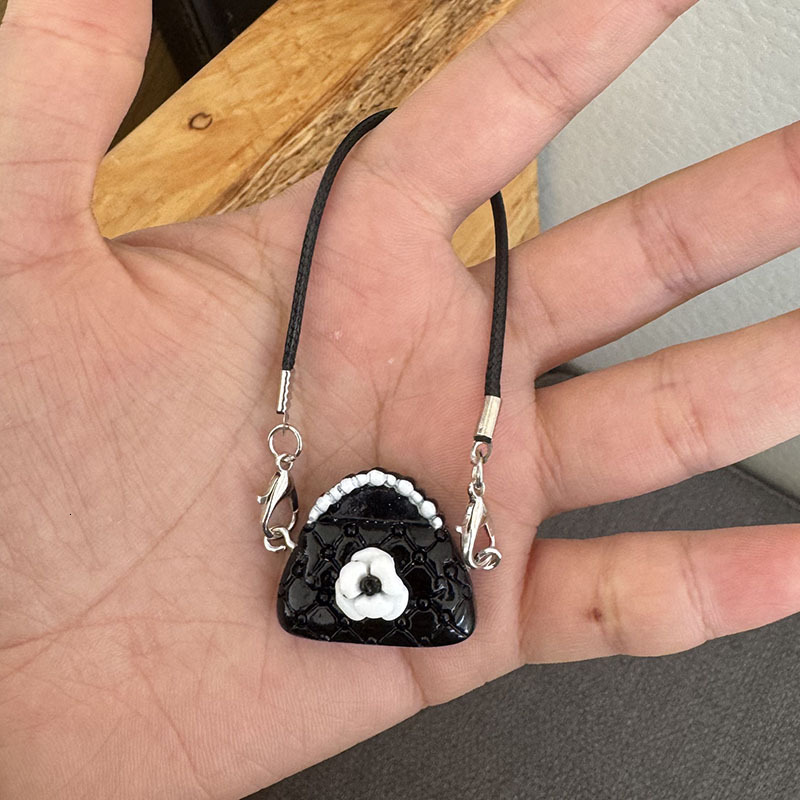 2025 New Women's Designer Cartoon Dollhouse Mini Camellia Black And White Bag Necklace Accessories Doll Pendant Accessories Handbag Accessories