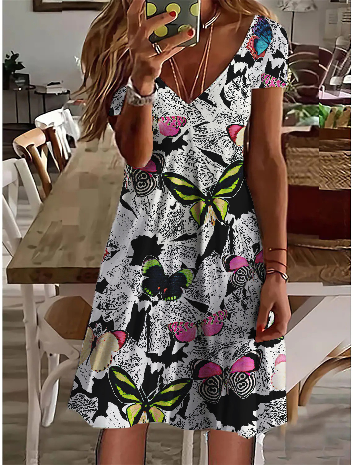 2025 Summer new women's dress, summer new casual V-neck loose print fashionable short sleeved dress, new designer dress
