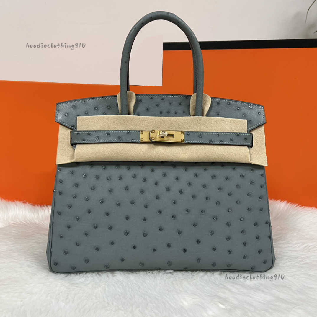 Totes Exotic Ostrich-Skin Handbag - Chic Womens Fashion Hand-Held Bag for Commuting and Everyday