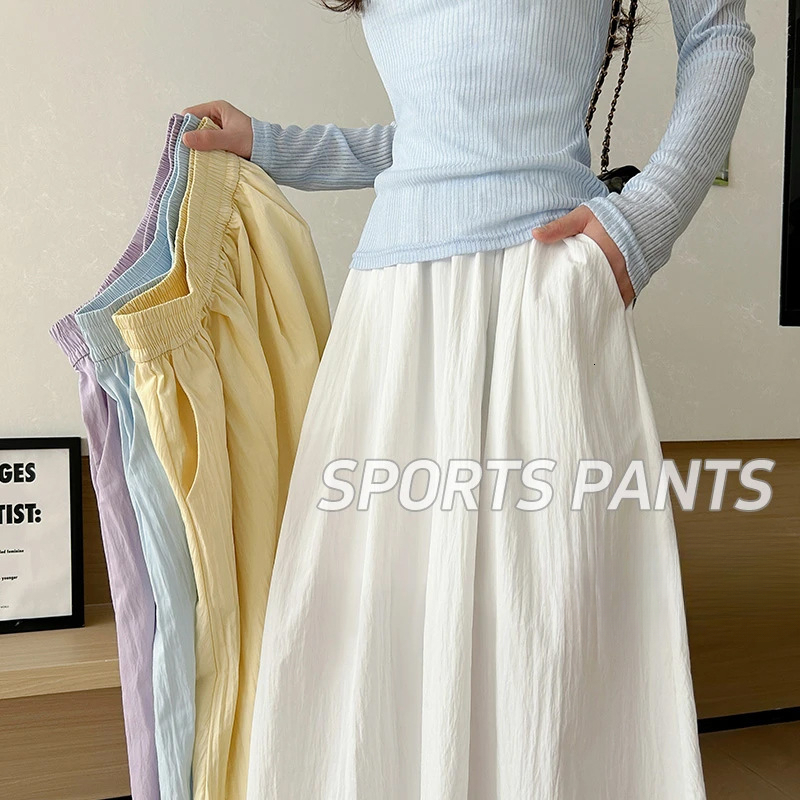2025 New women's skirt, new summer high waisted A-line slim fit pleated umbrella pleated long skirt, new solid color minimalist style designer sk