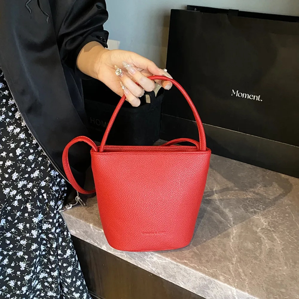 Korean niche simple mobile phone bag womens summer fashion messenger shoulder bucket bag 250704