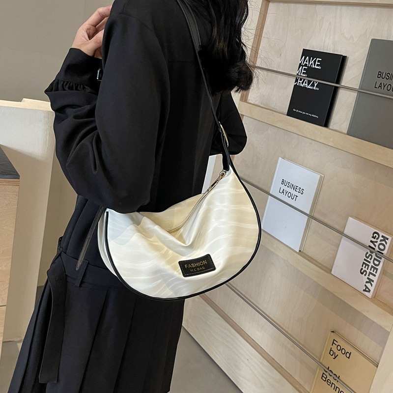 Women s new niche dumpling bag multifunctional leisure casual shoulder bag designer bag cross border women s crossbody bag