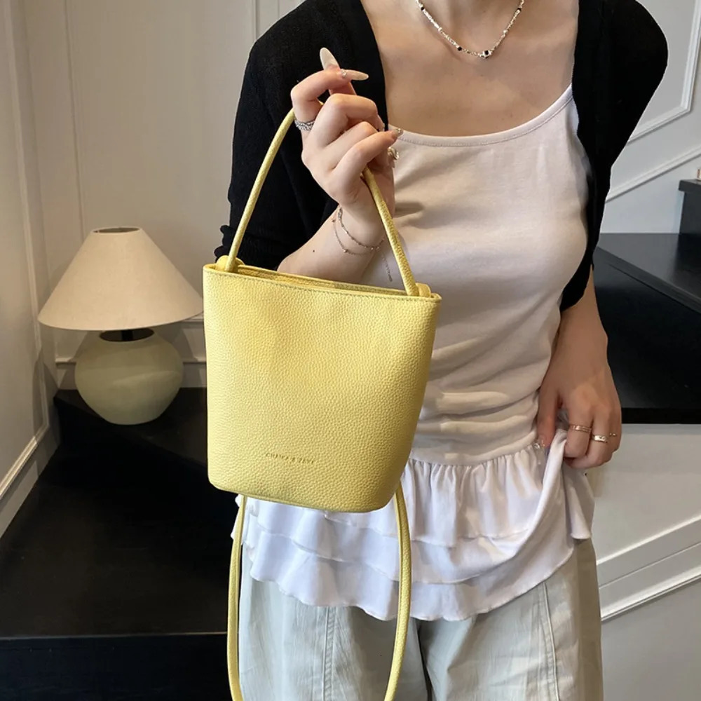 Korean niche simple mobile phone bag womens summer fashion messenger shoulder bucket bag 250704