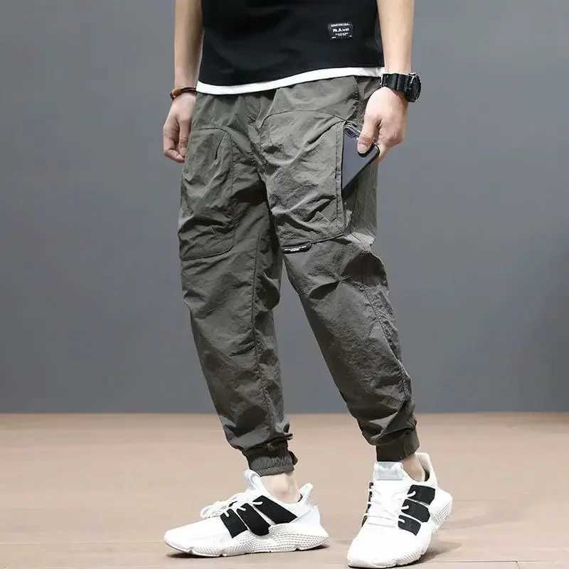 Fashion Summer Lightweight Mens Luxury Designer Pants Casual with Slim Fit and Letter Printed Black Trousers Jogger Pants Men W250715