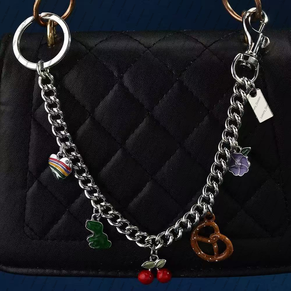 bag charm Dinosaur Cherry pretzel Charm Accessories Designer Womens Bag or Keychain Pendant co ch Cherry Decoration Personalized Womens Wallet chain dhgate