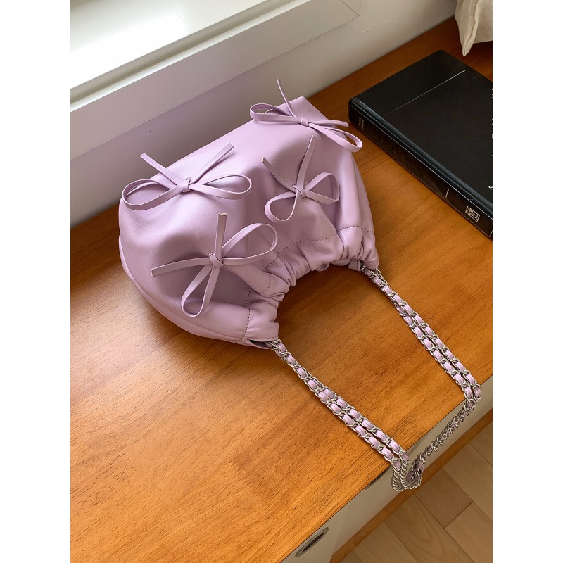 Elegant Ladies Designer Pocketbook Featuring a Cute Ribbon Detail & Durable Material