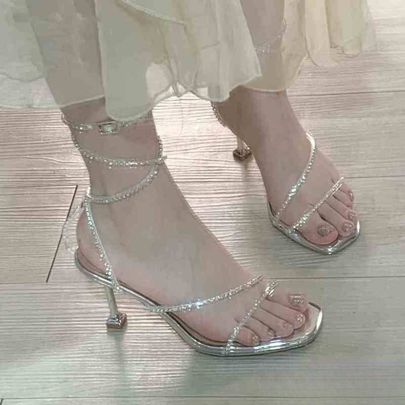 Designer sandals Giant Sparkle~2025 Summer Silver Rhinestone Sandals Fairy Open-Toe Snake-Shaped Wrap Strap One-Word Buckle Thin Heel High Heels