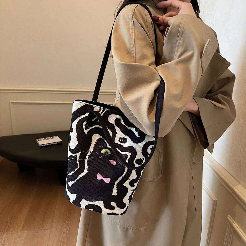 Women's Casual Hand Bucket 2025 Autumn And Winter Striped Simple Kitten Canvas Shoulder Bag