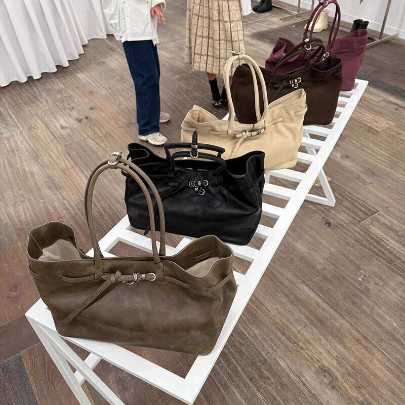 Elegant Women's Suede Handbags With Distinctive Accessories Inspired by K-Pop Stars