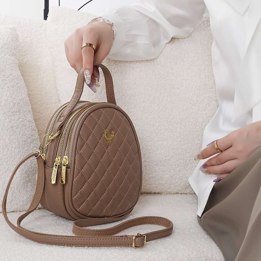 Quilted Leather Crossbody Phone Bag with Charm Stylish Compact Shoulder Purse for Travel Daily Use Lightweight and Durable Handheld Design
