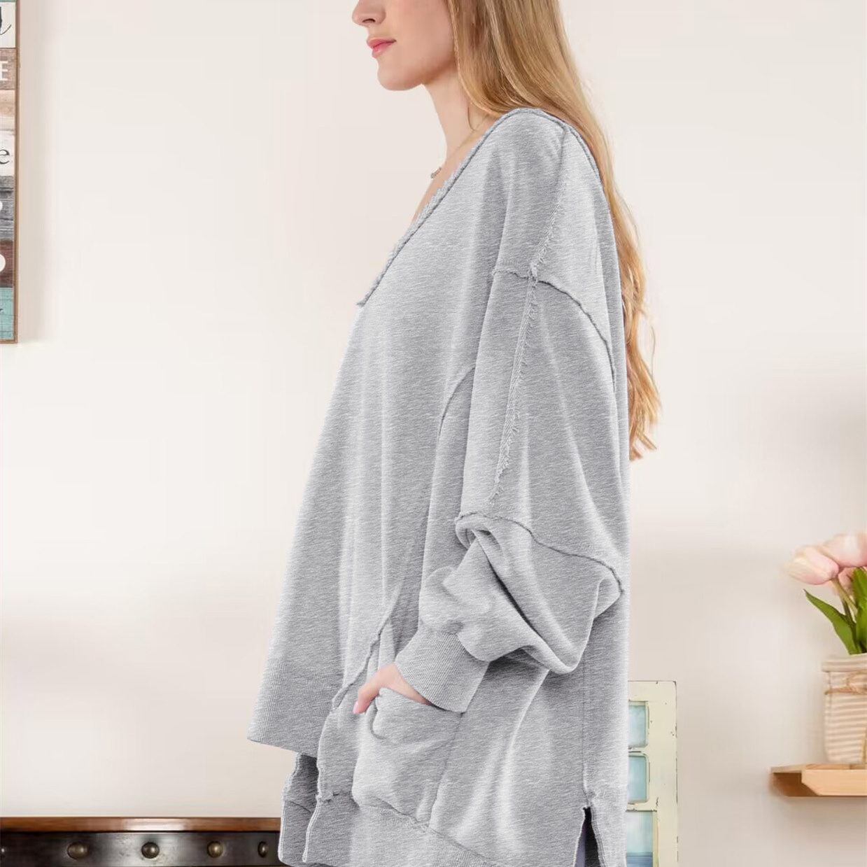 hot Free shipping designer hoodie for women Lantern sleeves loose V neck irregular hem design long sleeved hoodie