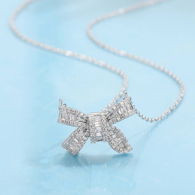 Glamorous Silver - Toned Bow Necklace Adorned With Baguette And Round Crystal Sparkle Luxe Style For Special Moments High - Quality Fashion Jewelry