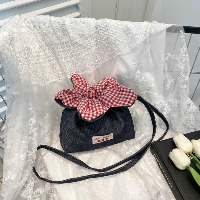 2025 New Summer Style Literary Plaid Cute Flower Drawstring Bag Womens Mobile Phone Bag Walking Bag Denim Crossbody Bag M250716