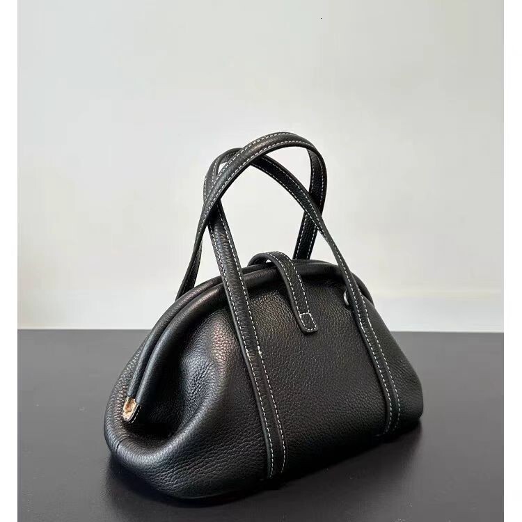 Designer 2025 New Model Vegetable Tanned Leather Clip Catfish High-end Feel Top Layer Cowhide Shell Shoulder Handbag Dumpling Light Luxury Women'