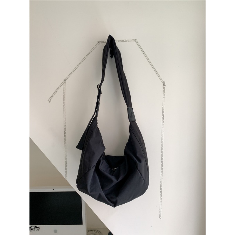 Fashionable Casual Messenger Bag for Ladies Durable Nylon with Spacious Interior & Unique Shape