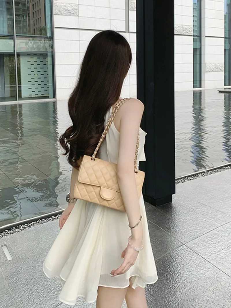 French Celebrity Irregular Chiffon Hanging Neck Dress Women Ruffled Edges Patchwork Ribbon Sleeveless Solid Summer Princess Wear R250716