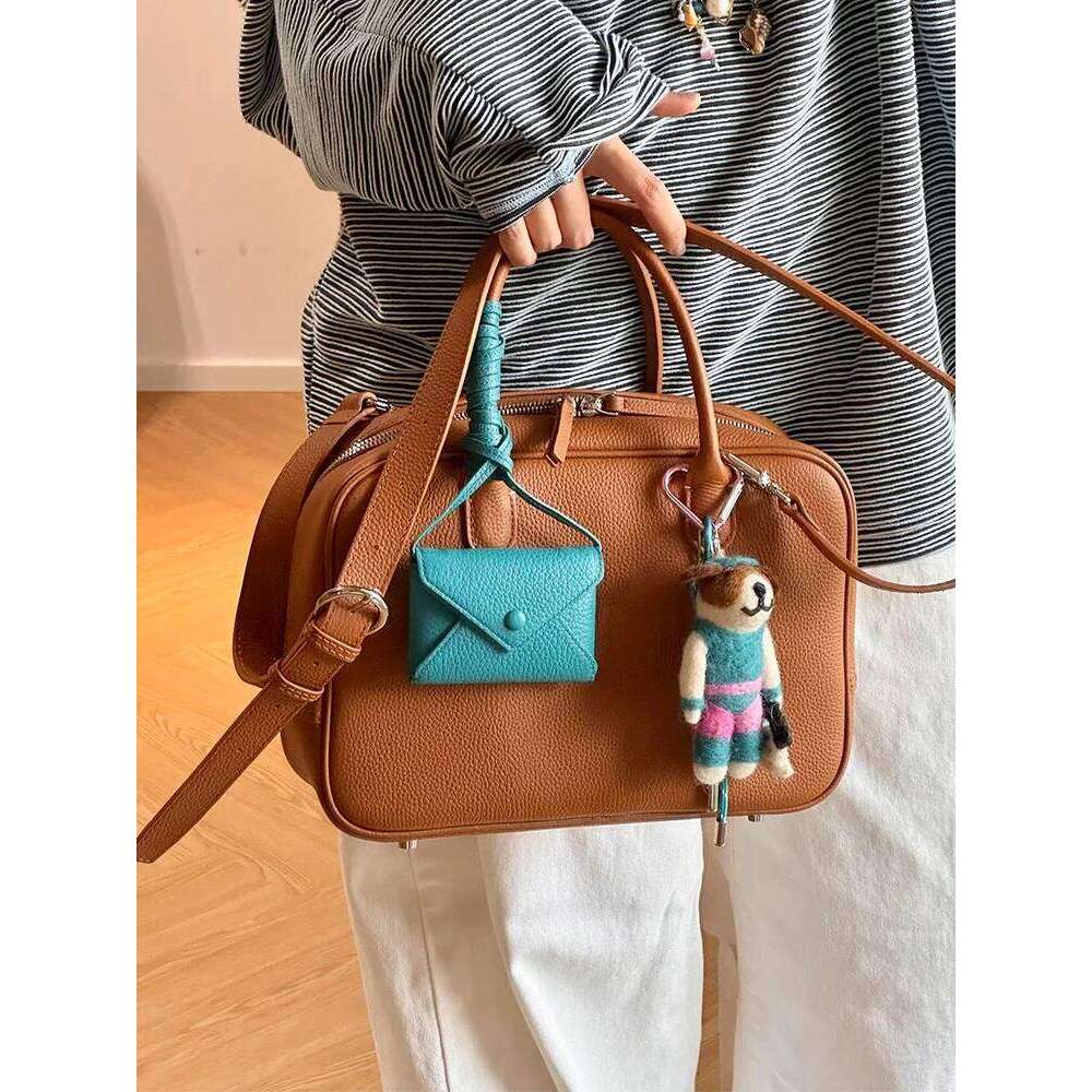 Large Capaci Women's Tote 2025 New Sle Commuter Bowling Handheld Boston Bag Faionable Cowhide Leather Handbag