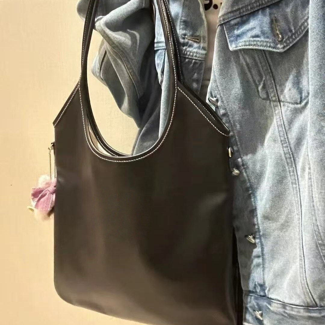 2025 New Canvas Bag Armpit Bag Large Capacity Bag Upright Handbag Shoulder Bag Crossbody Bag Women's Handbag Letter Bag Real Leather Bag Light Luxury Designer Bag
