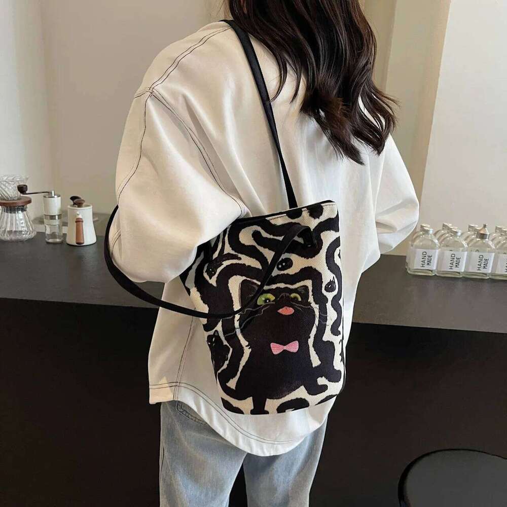Women's Casual Hand Bucket 2025 Autumn And Winter Striped Simple Kitten Canvas Shoulder Bag