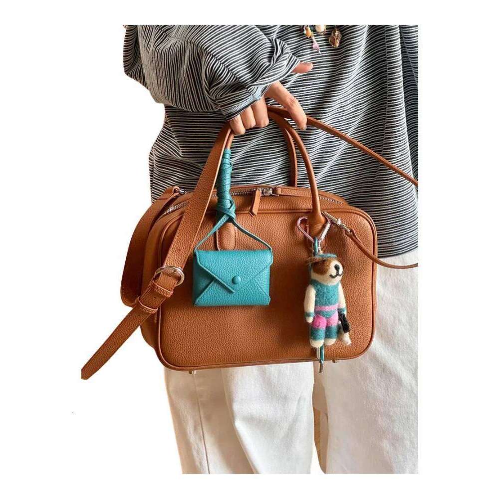 Large Capaci Women's Tote 2025 New Sle Commuter Bowling Handheld Boston Bag Faionable Cowhide Leather Handbag