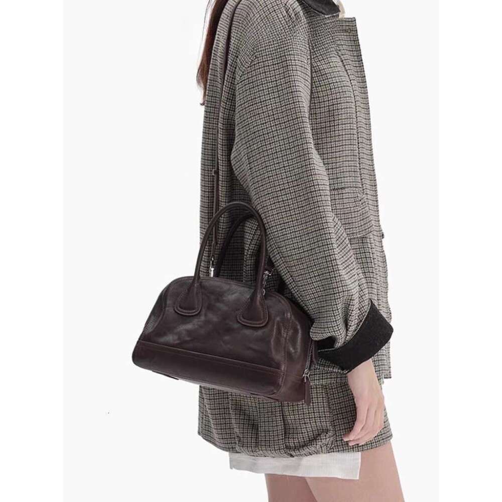 Korean New Niche Bowling Handheld Women's Soft Leather High-Quality Simple Versatile Shoulder Crossbody Bag