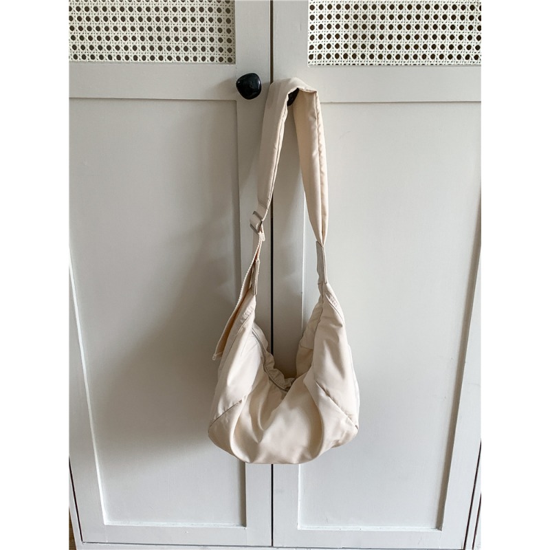 Fashionable Casual Messenger Bag for Ladies Durable Nylon with Spacious Interior & Unique Shape