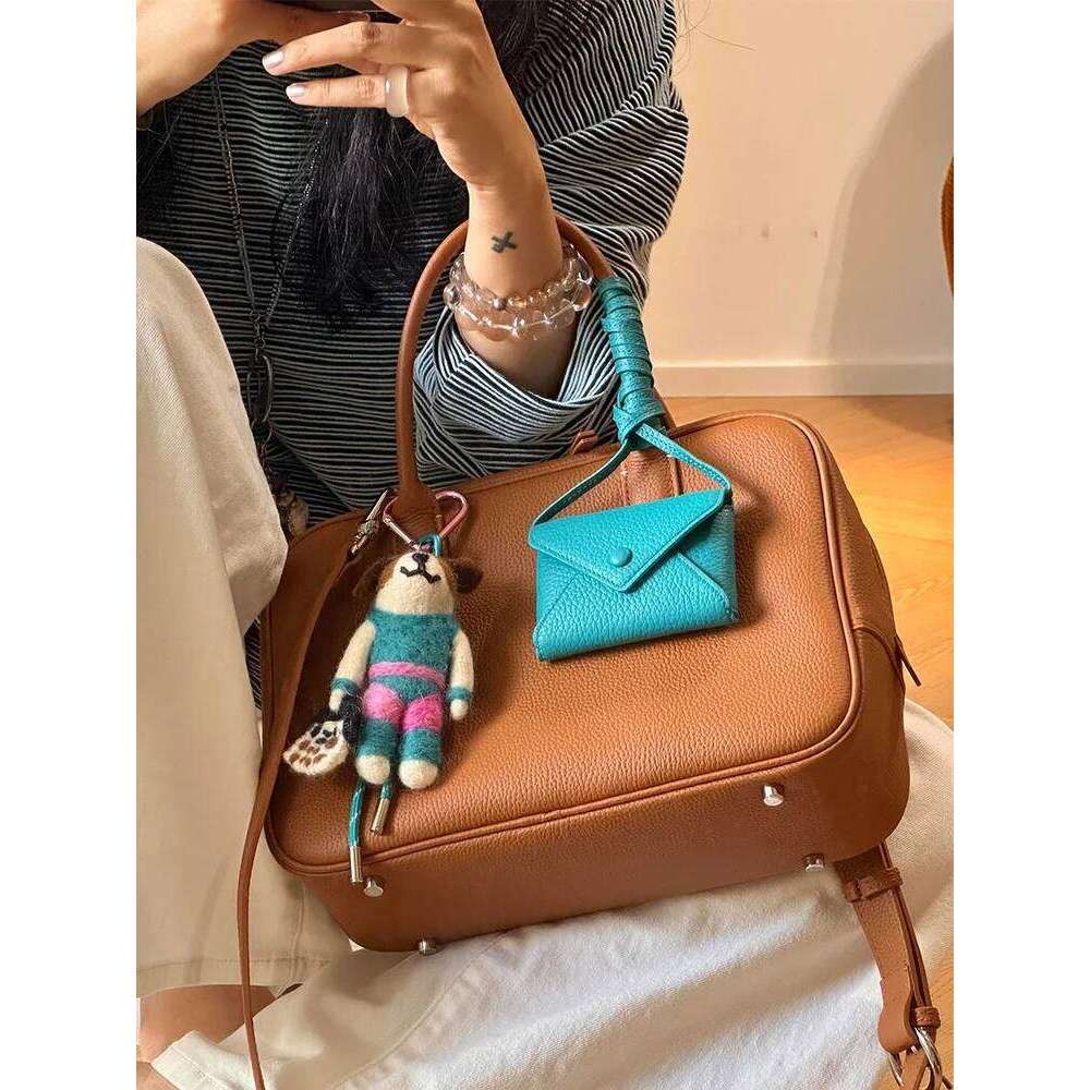 Large Capaci Women's Tote 2025 New Sle Commuter Bowling Handheld Boston Bag Faionable Cowhide Leather Handbag