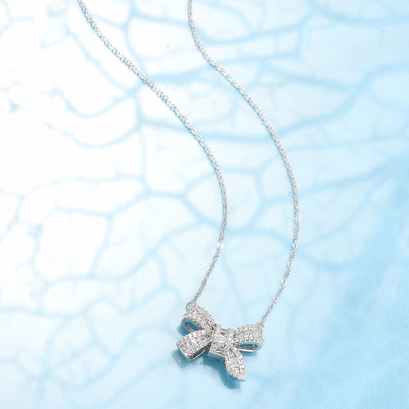 Glamorous Silver - Toned Bow Necklace Adorned With Baguette And Round Crystal Sparkle Luxe Style For Special Moments High - Quality Fashion Jewelry