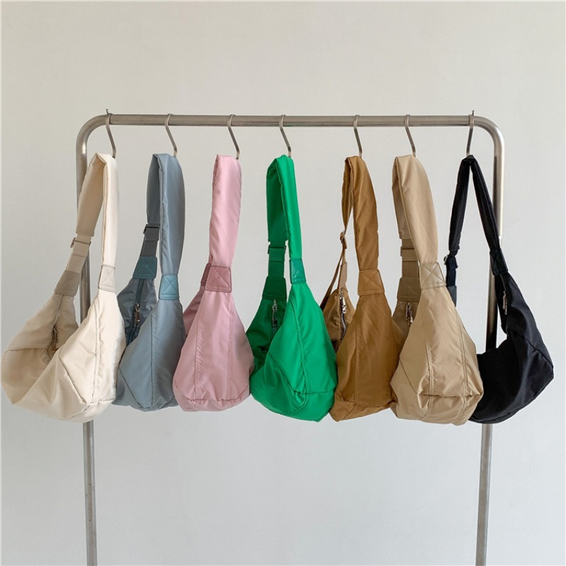 Fashionable Casual Messenger Bag for Ladies Durable Nylon with Spacious Interior & Unique Shape