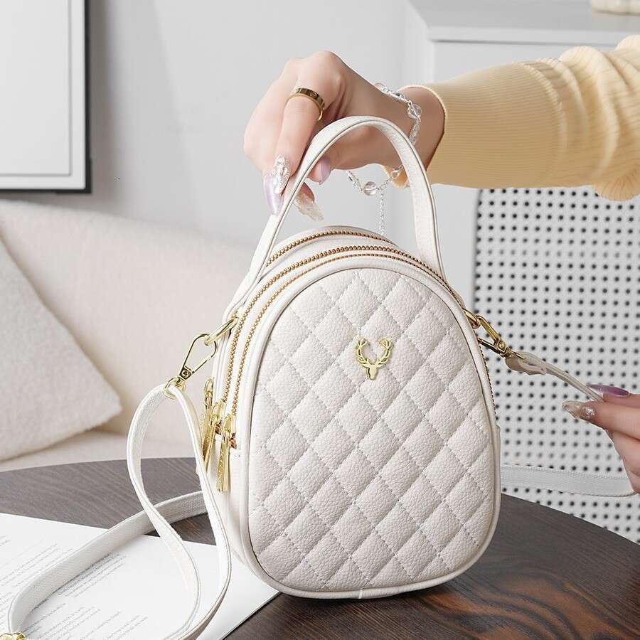 Quilted Leather Crossbody Phone Bag with Charm Stylish Compact Shoulder Purse for Travel Daily Use Lightweight and Durable Handheld Design
