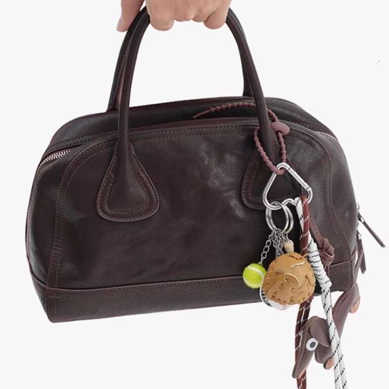 Korean New Niche Bowling Handheld Women's Soft Leather High-Quality Simple Versatile Shoulder Crossbody Bag