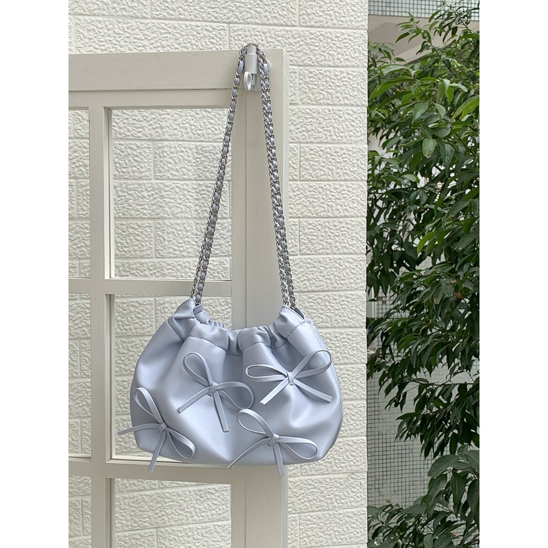 Elegant Ladies Designer Pocketbook Featuring a Cute Ribbon Detail & Durable Material