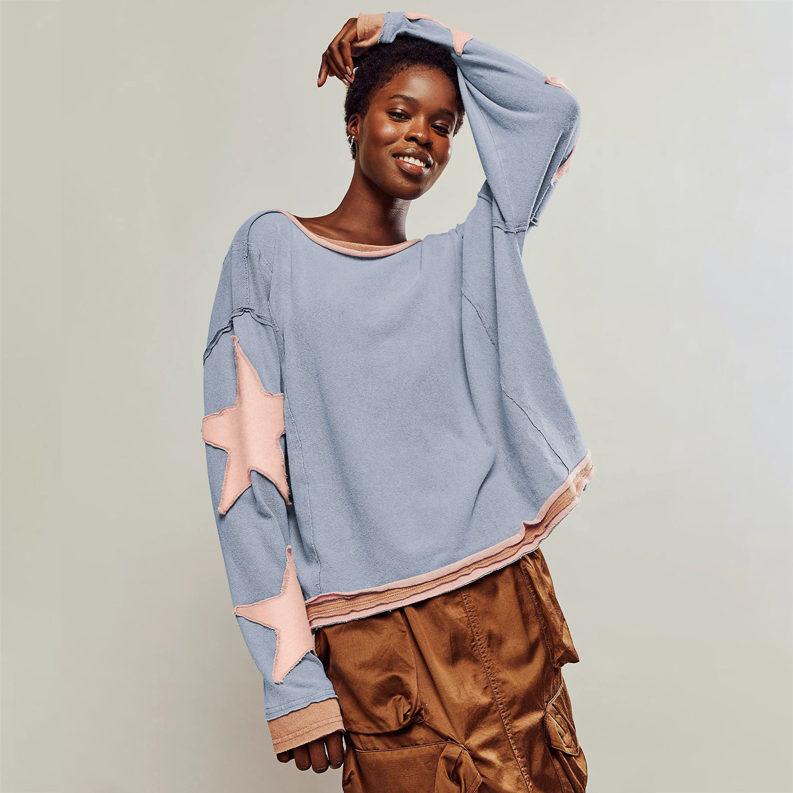 hot Free shipping designer hoodie for women Color blocking patchwork fashionable long sleeved top with off shoulder round neck and star decorative lin