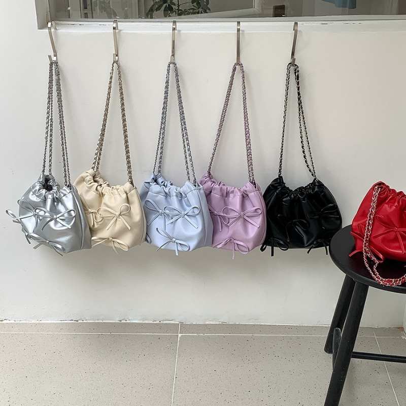 Elegant Ladies Designer Pocketbook Featuring a Cute Ribbon Detail & Durable Material