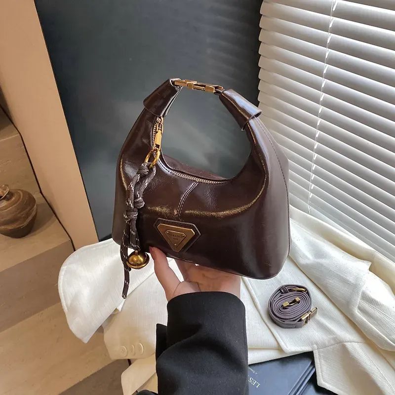 Designer bag luxury handbag wallet women's shoulder bag 2025 new summer versatile crossbody bag popular broadband single shoulder dumpling bag