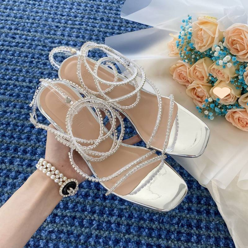 Designer sandals Giant Sparkle~2025 Summer Silver Rhinestone Sandals Fairy Open-Toe Snake-Shaped Wrap Strap One-Word Buckle Thin Heel High Heels