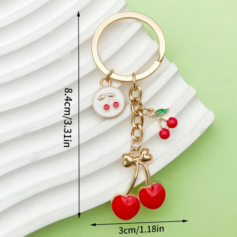 Versatile Key Ring with Sparkling Cherry Design - Stylish Pearled Ornamentation