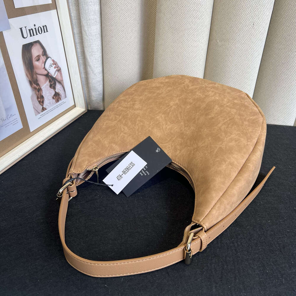 Elegant Suede Purse with Detachable Strap for Versatile Wear
