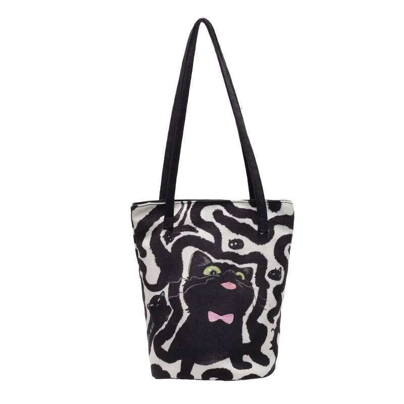 Women's Casual Hand Bucket 2025 Autumn And Winter Striped Simple Kitten Canvas Shoulder Bag