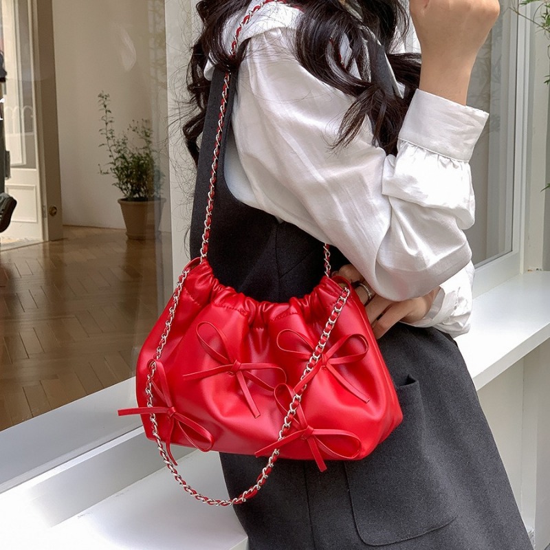 Elegant Ladies Designer Pocketbook Featuring a Cute Ribbon Detail & Durable Material