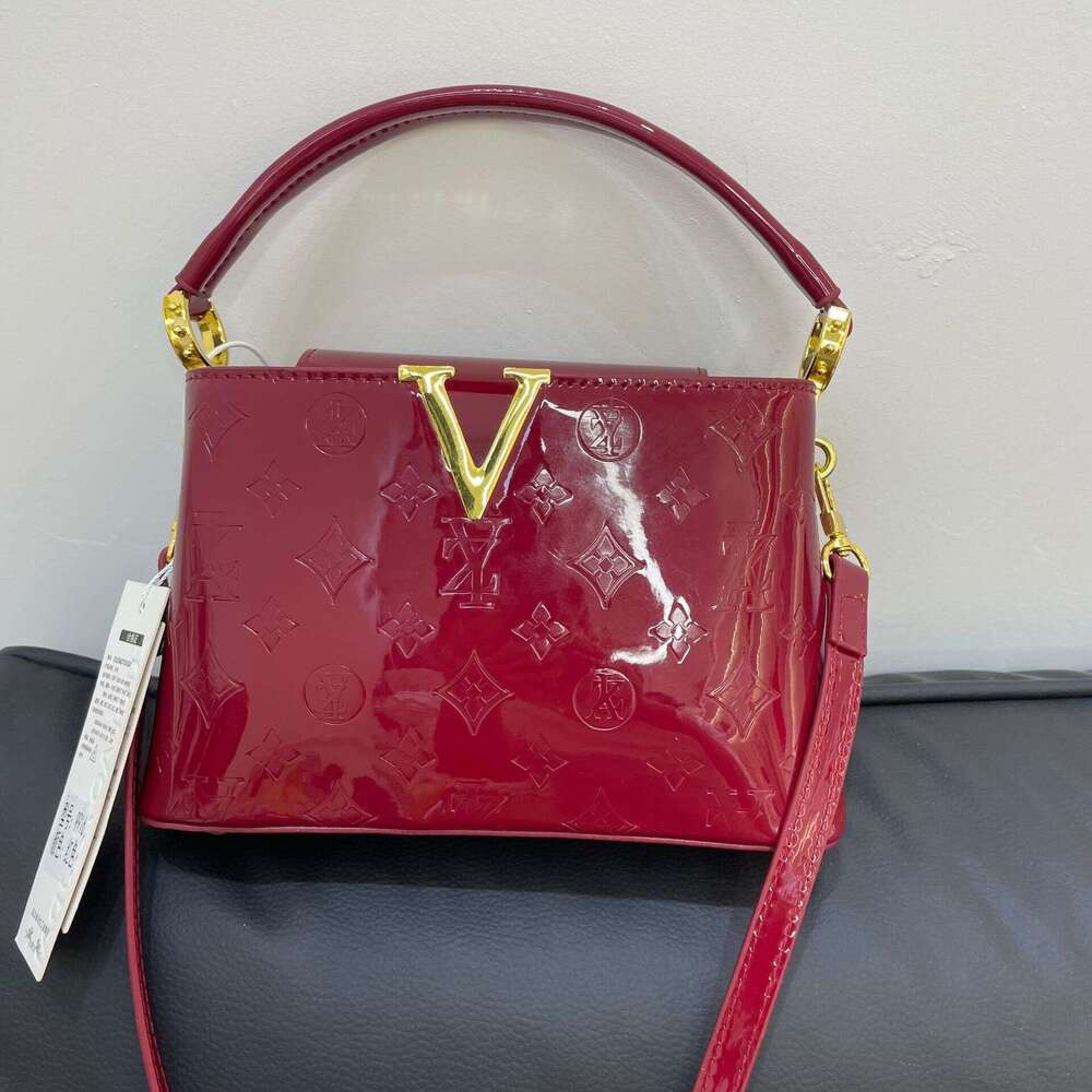 Fashion Patent Leather Handheld Bucket Bag 2025 New Fashion Single Shoulder Crossbody Commuter Versatile Niche Brand Elegant Women
